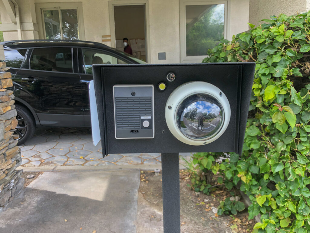Surveillance camera with intercom access control.